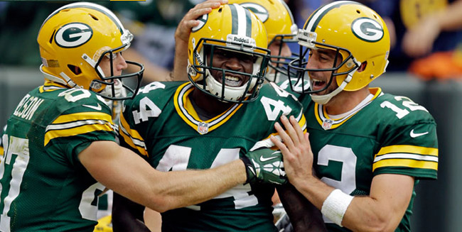 Packers roll Redskins