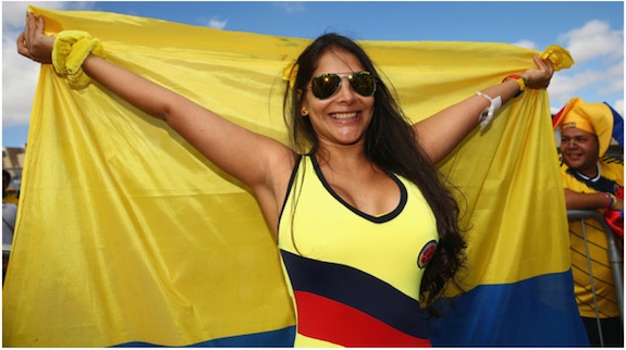 A Colombia fan holds a flag prior to the 2014 FIFA World Cup Brazil Group C match between Colombia and Greece at Estadio Mineirao on June 14, 2014 in Belo Horizonte, Brazil.