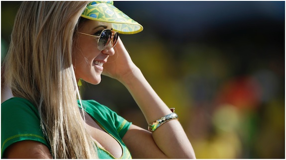 A Brazil fan waits for the start of the group A World Cup soccer match between Brazil and Croatia, the opening game of the tournament, in the Itaquerao Stadium in Sao Paulo, Brazil, Thursday, June 12, 2014. 
