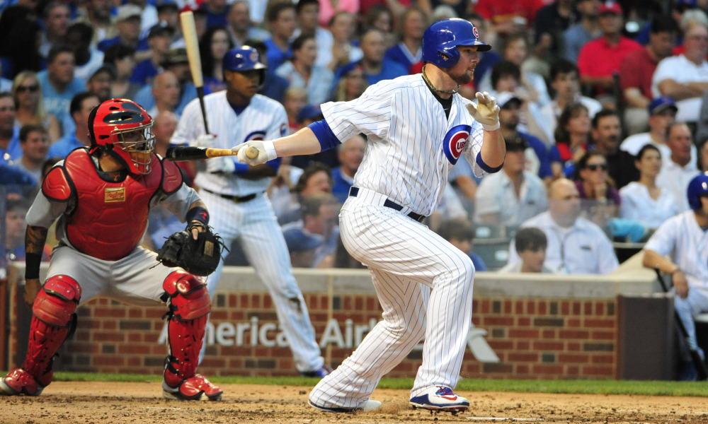 Chicago Cubs Jon Lester gets his first MLB base hit against the St. Louis Cardinals during the second inning of a baseball game, Monday, July 6, 2015, in Chicago. (AP Photo/David Banks) ORG XMIT: CXC105